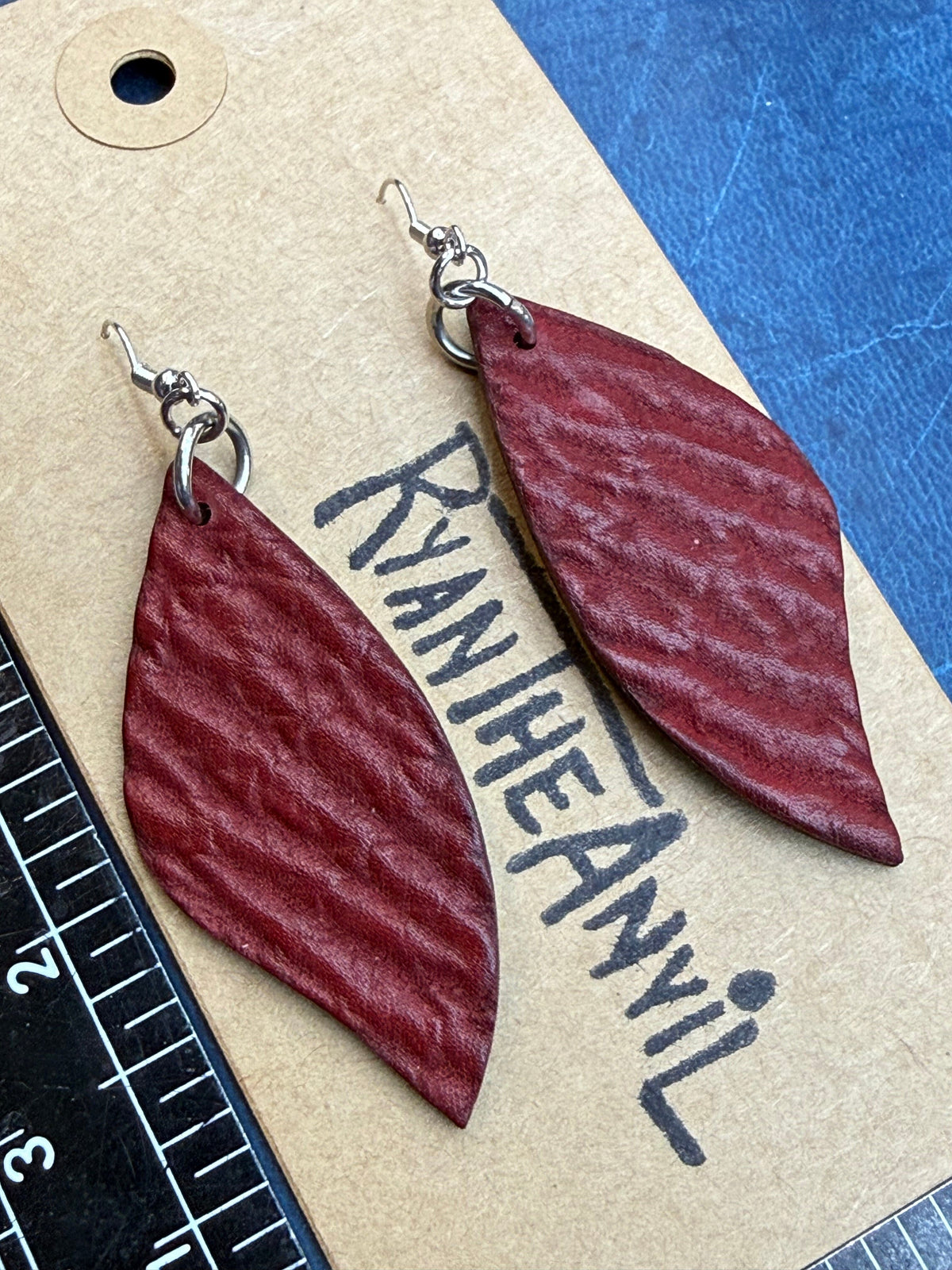 Exotic Leather Earrings: Red Shark Leaf Shaped - Anvil Customs